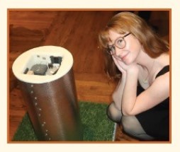 Keleigh McMullen with ceramic sculpture